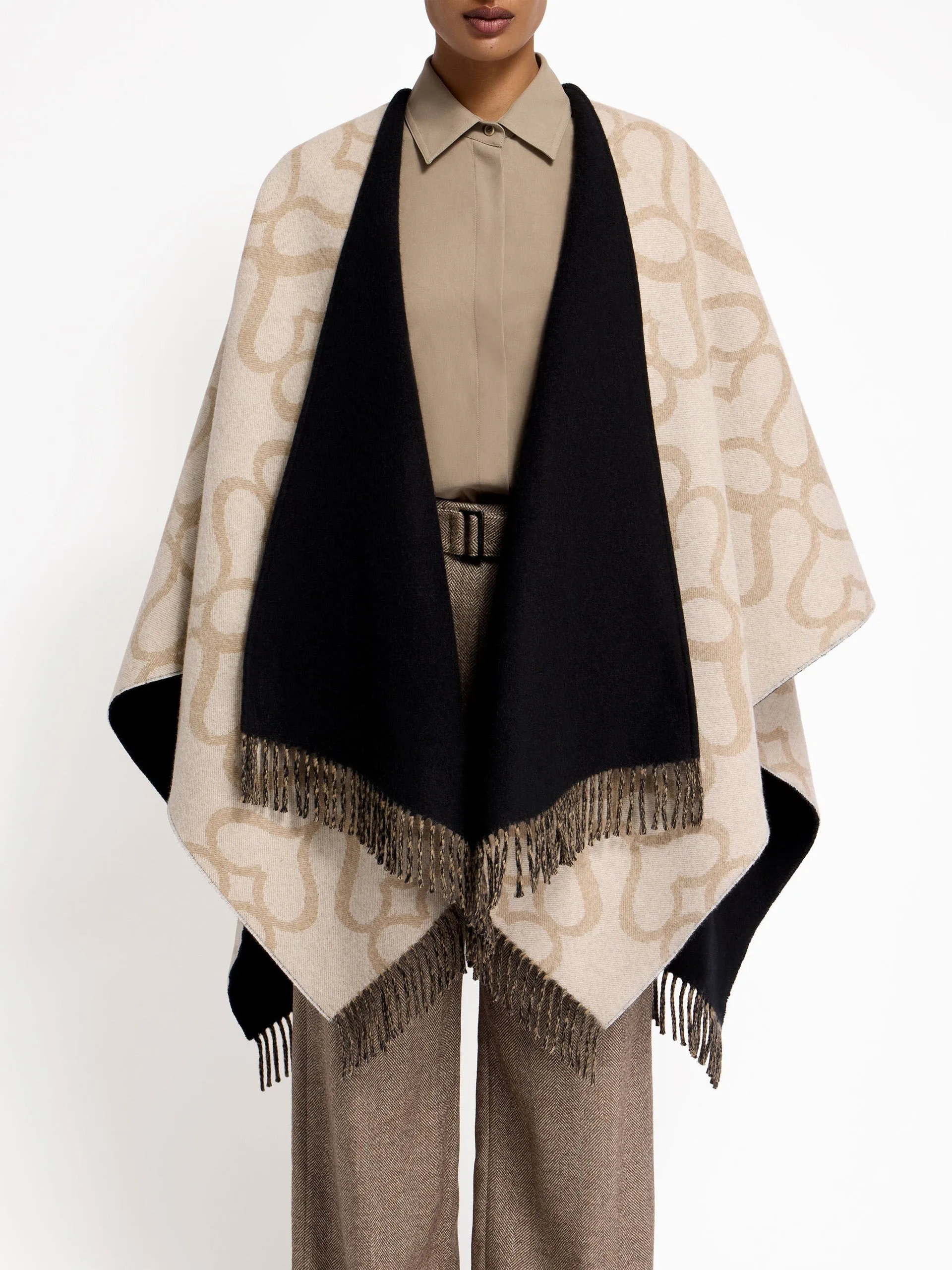 Black, camel, and vanilla monogram reversible cape